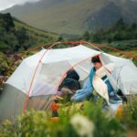 Young couple in a tent on a weekend camping trip